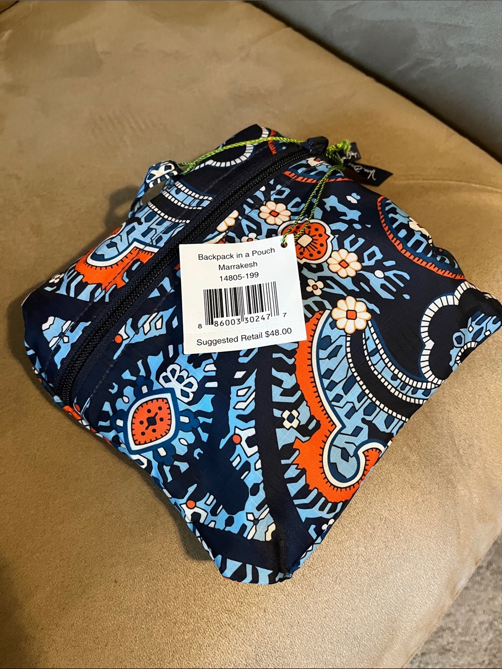 Vera Bradley backpack in a pouch